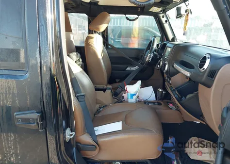 2014 Jeep Wrangler Unlimited Sahara z USA, uszkodzony, nr VIN 1C4BJWEGXEL224686